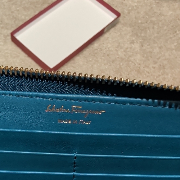 Salvatore Ferragamo Teal Leather Wallet with Gold Bow Accent